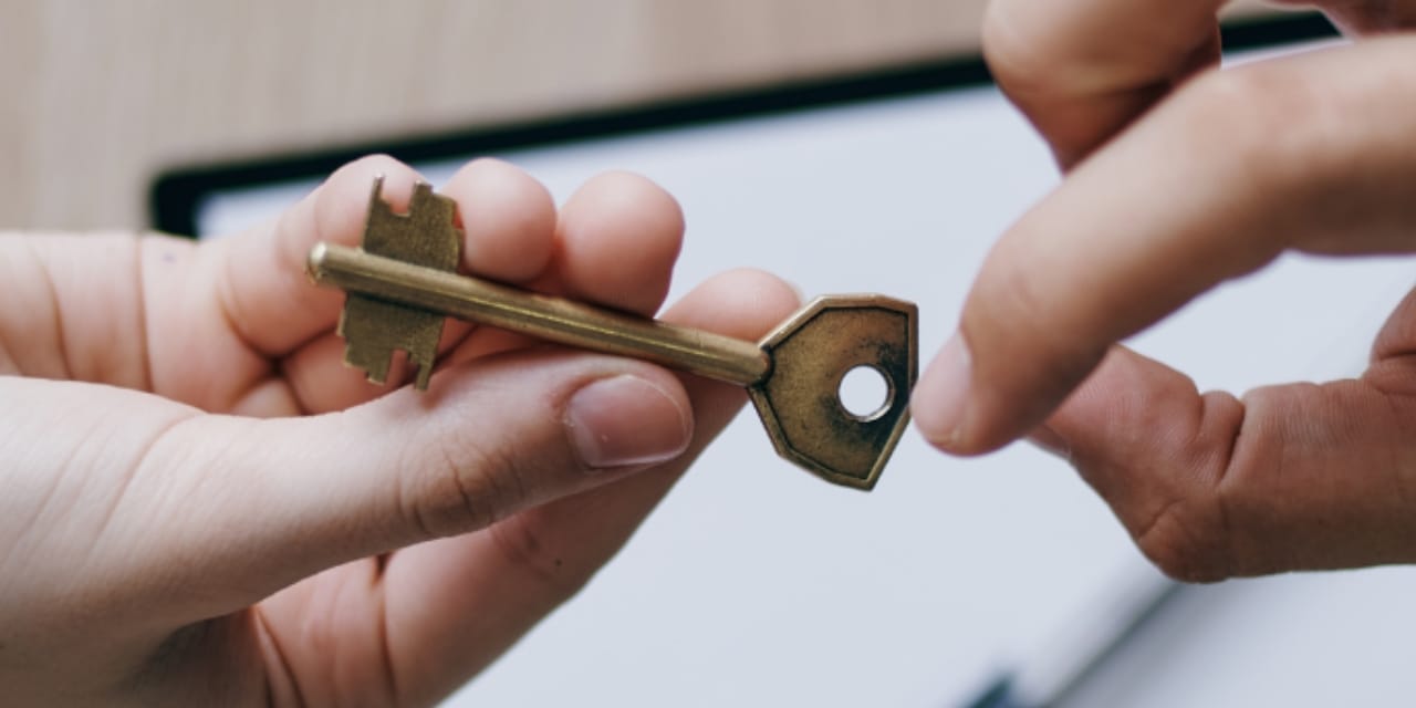 handing over keys to pharmacy